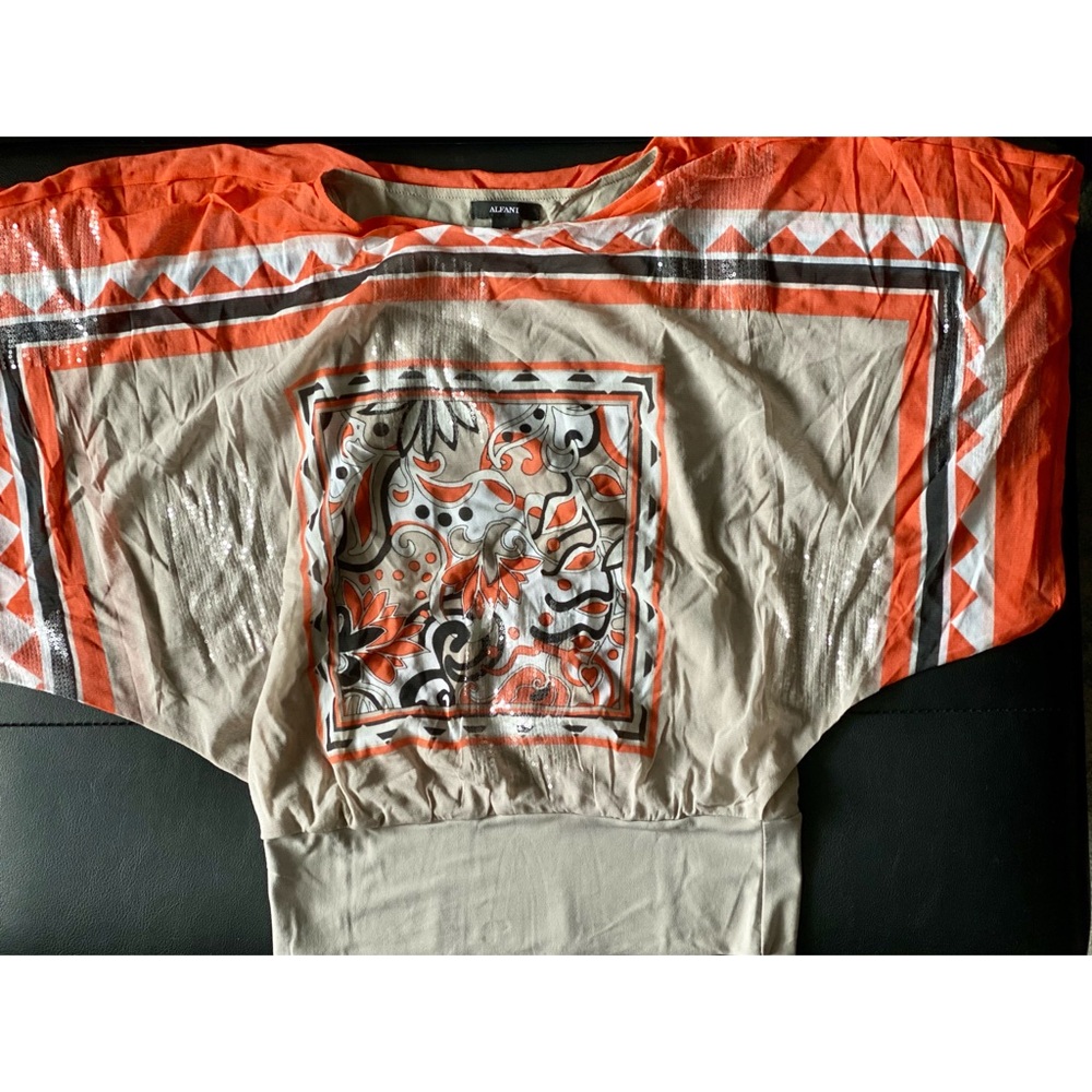 Wing Span Sleeve Top